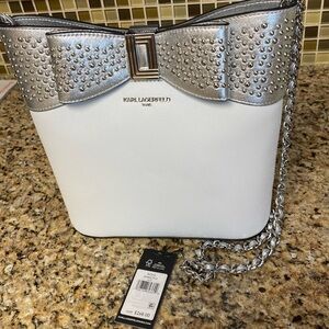 New purchase from Saks Fifth Avenue too small for me with bow embellish studs.